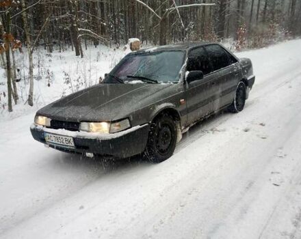 Серый Мазда 626, объемом двигателя 2 л и пробегом 370 тыс. км за 1150 $, фото 1 на Automoto.ua