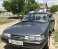 Серый Мазда 626, объемом двигателя 2 л и пробегом 286 тыс. км за 1000 $, фото 1 на Automoto.ua