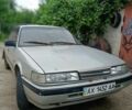 Серый Мазда 626, объемом двигателя 2 л и пробегом 500 тыс. км за 704 $, фото 1 на Automoto.ua
