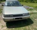 Серый Мазда 626, объемом двигателя 2 л и пробегом 1 тыс. км за 800 $, фото 1 на Automoto.ua