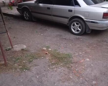 Сірий Мазда 626, об'ємом двигуна 2 л та пробігом 430 тис. км за 1350 $, фото 1 на Automoto.ua