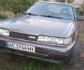 Серый Мазда 626, объемом двигателя 2 л и пробегом 384 тыс. км за 1000 $, фото 1 на Automoto.ua