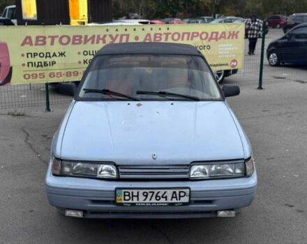 Серый Мазда 626, объемом двигателя 1.6 л и пробегом 250 тыс. км за 600 $, фото 1 на Automoto.ua