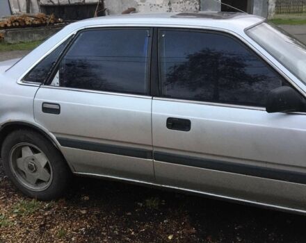 Серый Мазда 626, объемом двигателя 2 л и пробегом 500 тыс. км за 2393 $, фото 1 на Automoto.ua