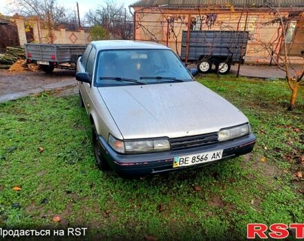 Серый Мазда 626, объемом двигателя 2 л и пробегом 450 тыс. км за 1000 $, фото 4 на Automoto.ua