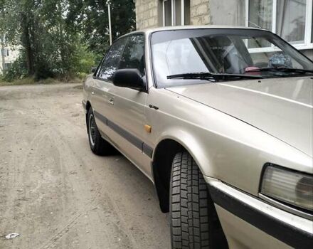 Серый Мазда 626, объемом двигателя 2 л и пробегом 410 тыс. км за 1900 $, фото 9 на Automoto.ua