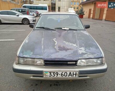 Серый Мазда 626, объемом двигателя 2 л и пробегом 449 тыс. км за 1300 $, фото 5 на Automoto.ua