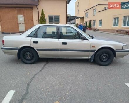 Серый Мазда 626, объемом двигателя 2 л и пробегом 449 тыс. км за 1300 $, фото 2 на Automoto.ua