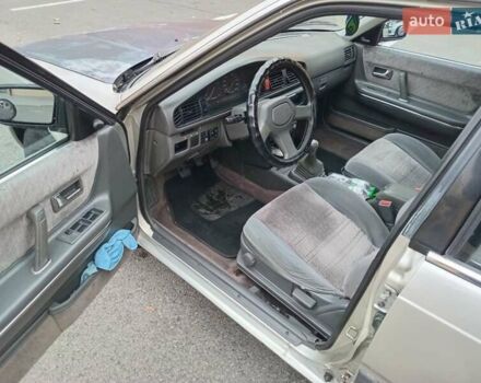 Серый Мазда 626, объемом двигателя 2 л и пробегом 449 тыс. км за 1300 $, фото 7 на Automoto.ua