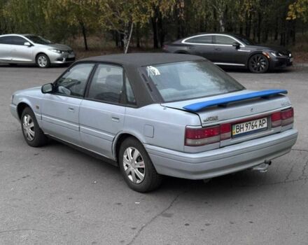 Серый Мазда 626, объемом двигателя 1.6 л и пробегом 250 тыс. км за 600 $, фото 5 на Automoto.ua