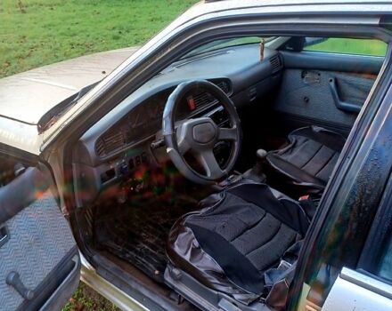 Серый Мазда 626, объемом двигателя 2 л и пробегом 450 тыс. км за 1000 $, фото 2 на Automoto.ua