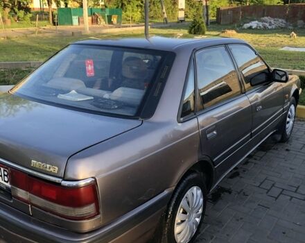 Серый Мазда 626, объемом двигателя 2 л и пробегом 300 тыс. км за 1700 $, фото 1 на Automoto.ua