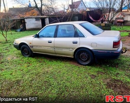 Серый Мазда 626, объемом двигателя 2 л и пробегом 450 тыс. км за 1000 $, фото 3 на Automoto.ua