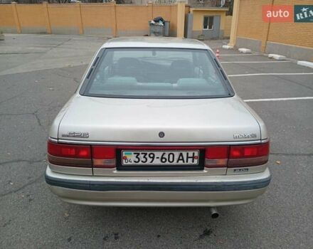 Серый Мазда 626, объемом двигателя 2 л и пробегом 449 тыс. км за 1300 $, фото 4 на Automoto.ua