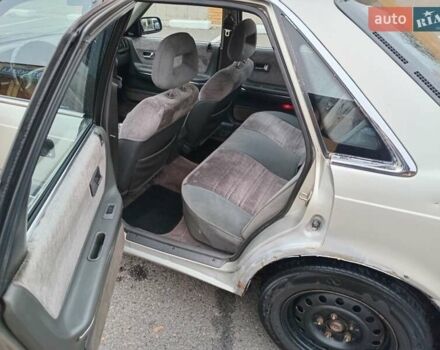 Серый Мазда 626, объемом двигателя 2 л и пробегом 449 тыс. км за 1300 $, фото 6 на Automoto.ua