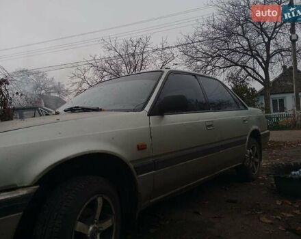 Серый Мазда 626, объемом двигателя 1.8 л и пробегом 594 тыс. км за 953 $, фото 2 на Automoto.ua