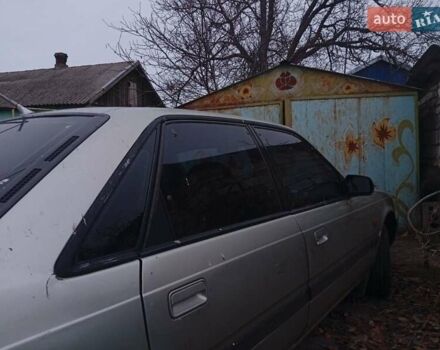 Серый Мазда 626, объемом двигателя 1.8 л и пробегом 594 тыс. км за 953 $, фото 3 на Automoto.ua