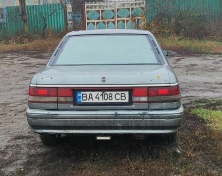 Серый Мазда 626, объемом двигателя 2 л и пробегом 400 тыс. км за 1547 $, фото 2 на Automoto.ua