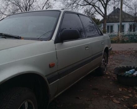 Серый Мазда 626, объемом двигателя 1.8 л и пробегом 594 тыс. км за 953 $, фото 1 на Automoto.ua