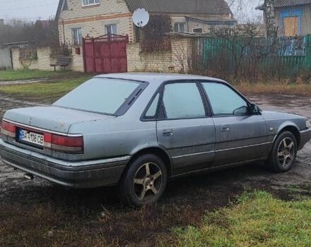 Серый Мазда 626, объемом двигателя 2 л и пробегом 400 тыс. км за 1547 $, фото 1 на Automoto.ua