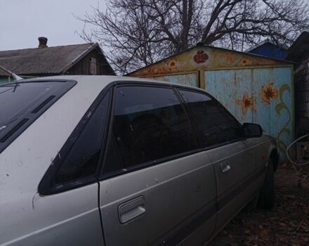 Серый Мазда 626, объемом двигателя 1.8 л и пробегом 594 тыс. км за 953 $, фото 4 на Automoto.ua