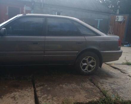 Сірий Мазда 626, об'ємом двигуна 2 л та пробігом 111 тис. км за 1500 $, фото 4 на Automoto.ua