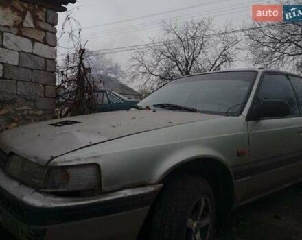 Серый Мазда 626, объемом двигателя 1.8 л и пробегом 594 тыс. км за 953 $, фото 1 на Automoto.ua