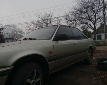 Серый Мазда 626, объемом двигателя 1.8 л и пробегом 594 тыс. км за 953 $, фото 3 на Automoto.ua