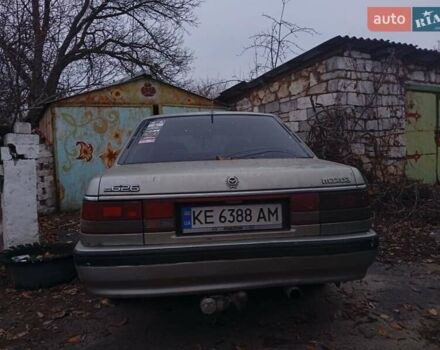 Серый Мазда 626, объемом двигателя 1.8 л и пробегом 594 тыс. км за 953 $, фото 4 на Automoto.ua