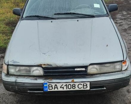 Серый Мазда 626, объемом двигателя 2 л и пробегом 400 тыс. км за 1547 $, фото 3 на Automoto.ua