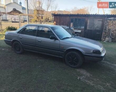 Серый Мазда 626, объемом двигателя 1.8 л и пробегом 330 тыс. км за 1500 $, фото 1 на Automoto.ua