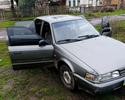 Сірий Мазда 626, об'ємом двигуна 2 л та пробігом 77 тис. км за 720 $, фото 5 на Automoto.ua