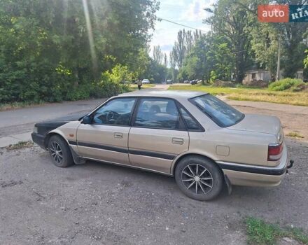 Сірий Мазда 626, об'ємом двигуна 1.8 л та пробігом 300 тис. км за 1600 $, фото 3 на Automoto.ua