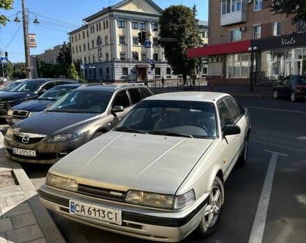 Сірий Мазда 626, об'ємом двигуна 2 л та пробігом 390 тис. км за 1900 $, фото 1 на Automoto.ua