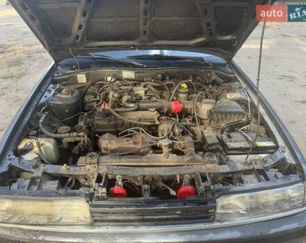 Серый Мазда 626, объемом двигателя 2 л и пробегом 326 тыс. км за 1200 $, фото 3 на Automoto.ua