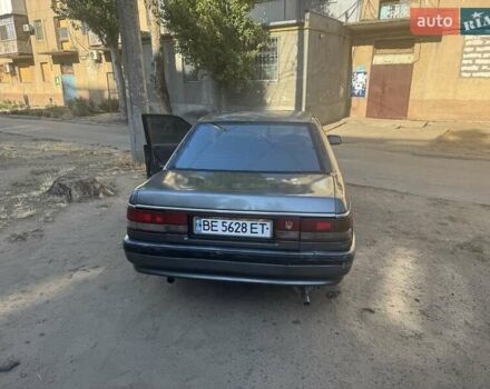 Серый Мазда 626, объемом двигателя 2 л и пробегом 326 тыс. км за 1200 $, фото 2 на Automoto.ua