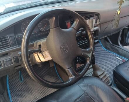 Серый Мазда 626, объемом двигателя 2 л и пробегом 348 тыс. км за 1300 $, фото 2 на Automoto.ua