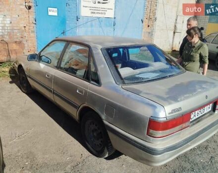 Серый Мазда 626, объемом двигателя 2 л и пробегом 170 тыс. км за 1700 $, фото 2 на Automoto.ua