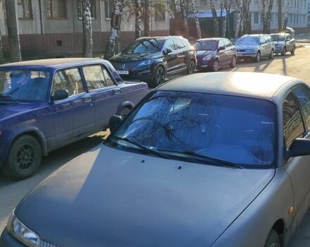 Серый Мазда 626, объемом двигателя 1.8 л и пробегом 390 тыс. км за 1200 $, фото 1 на Automoto.ua