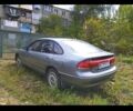 Серый Мазда 626, объемом двигателя 1.8 л и пробегом 600 тыс. км за 2000 $, фото 1 на Automoto.ua