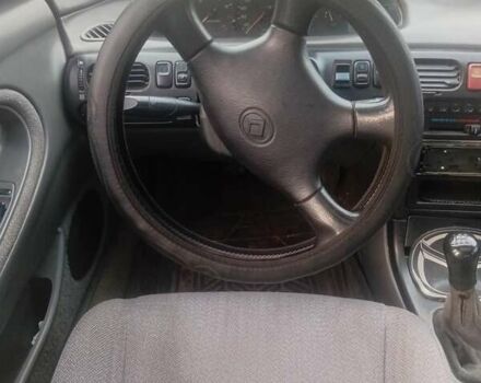 Серый Мазда 626, объемом двигателя 2 л и пробегом 404 тыс. км за 1300 $, фото 7 на Automoto.ua