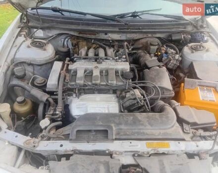 Серый Мазда 626, объемом двигателя 2 л и пробегом 404 тыс. км за 1300 $, фото 1 на Automoto.ua