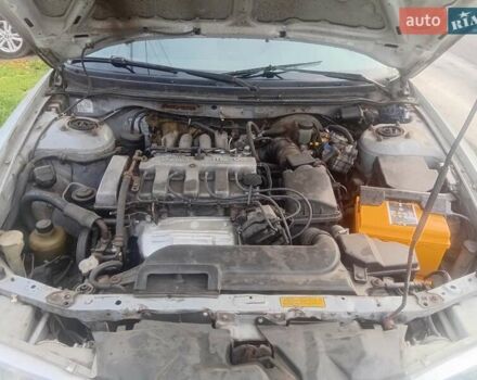 Серый Мазда 626, объемом двигателя 2 л и пробегом 404 тыс. км за 1300 $, фото 2 на Automoto.ua