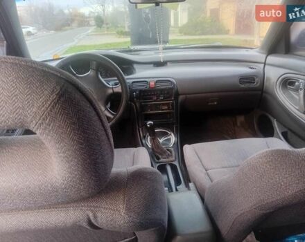 Серый Мазда 626, объемом двигателя 2 л и пробегом 404 тыс. км за 1300 $, фото 4 на Automoto.ua