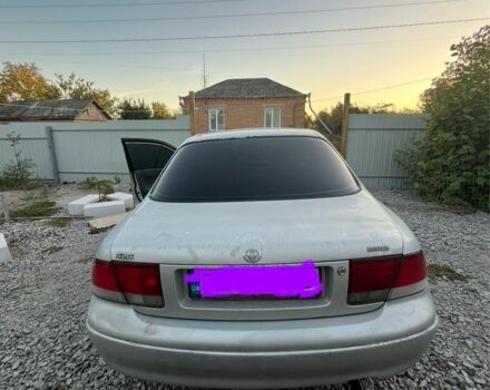 Серый Мазда 626, объемом двигателя 1.8 л и пробегом 500 тыс. км за 1500 $, фото 2 на Automoto.ua