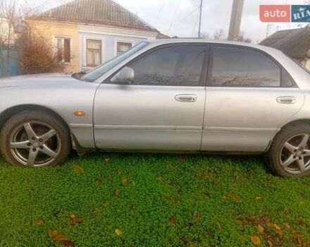 Серый Мазда 626, объемом двигателя 2 л и пробегом 404 тыс. км за 1300 $, фото 6 на Automoto.ua