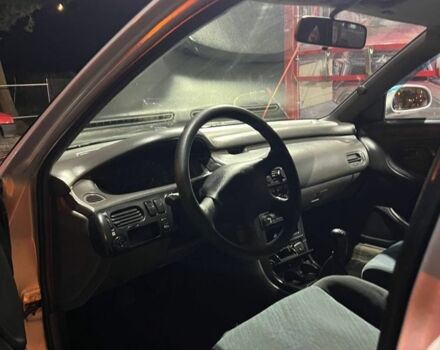 Серый Мазда 626, объемом двигателя 2 л и пробегом 307 тыс. км за 2399 $, фото 7 на Automoto.ua