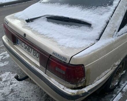 Серый Мазда 626, объемом двигателя 2.2 л и пробегом 450 тыс. км за 1200 $, фото 3 на Automoto.ua