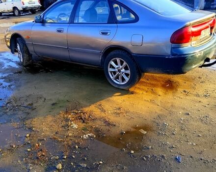 Серый Мазда 626, объемом двигателя 2 л и пробегом 300 тыс. км за 1650 $, фото 1 на Automoto.ua