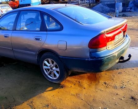 Серый Мазда 626, объемом двигателя 2 л и пробегом 300 тыс. км за 1650 $, фото 2 на Automoto.ua